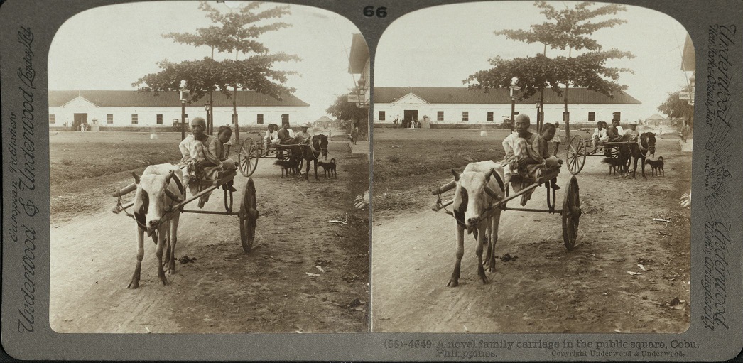 A novel family carriage in the public square, Cebu, Philippines.